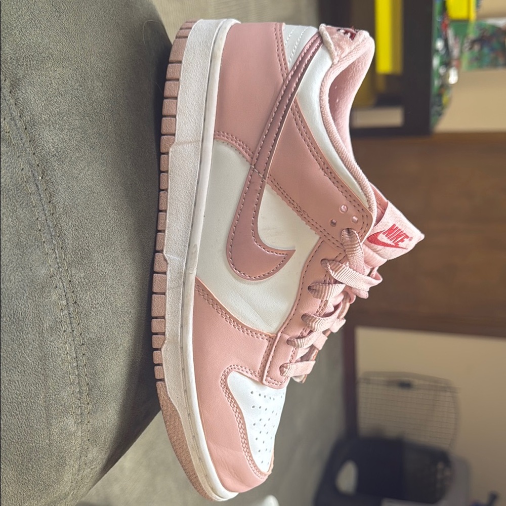 Nike Pink and White Sneakers with Low Top Design